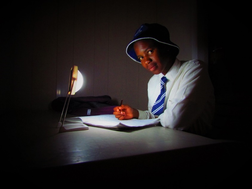 Student using solar light for studying