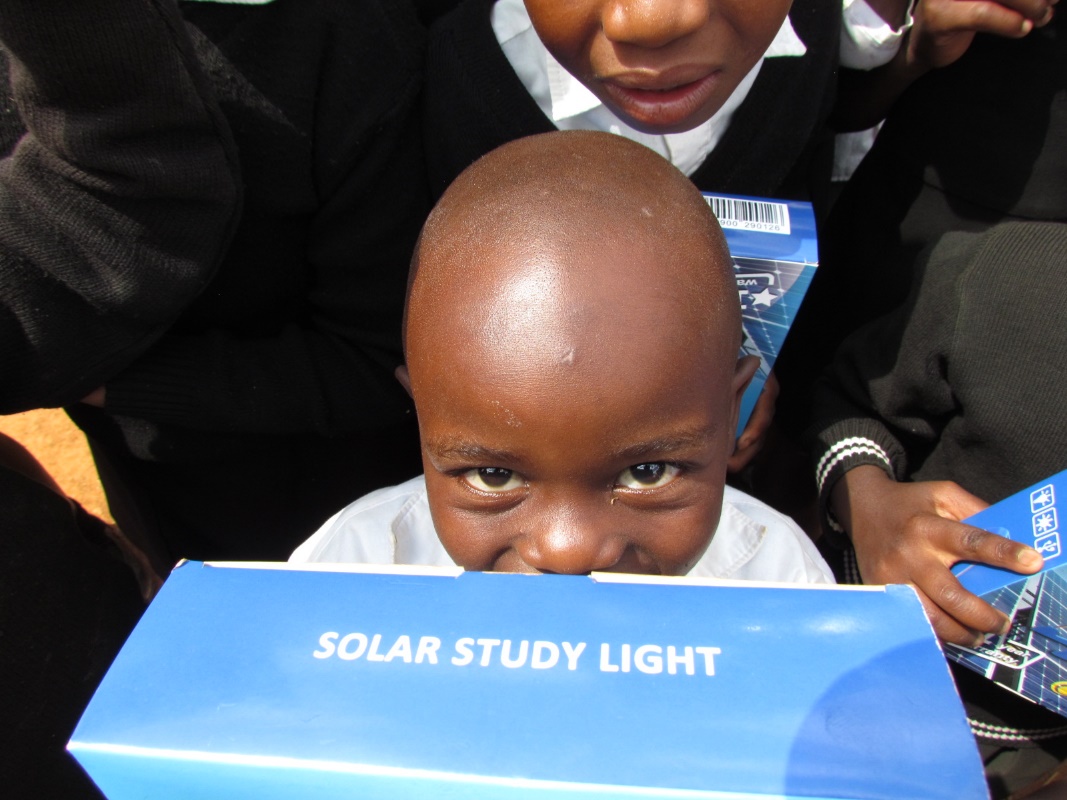 Young student with solar light