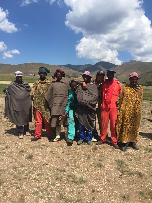Herd boys gather for a photo. These young men spend a large amount of their time isolated in the remote mountanous regions of Lesotho herding animals to provide for their families.