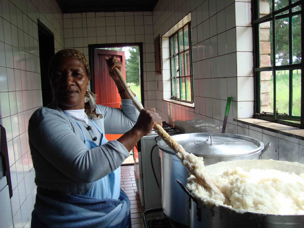 Woman in Lesotho mixing Papa
