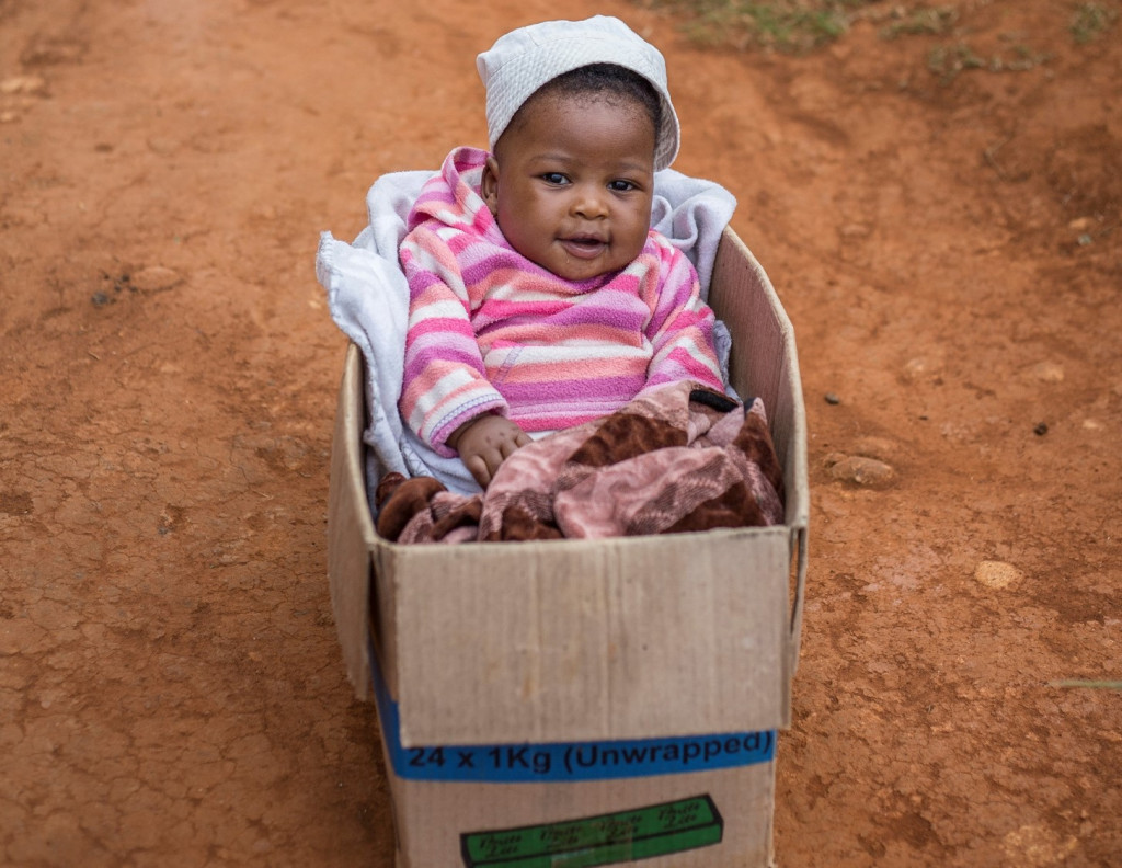 Basotho Baby in cardboard box