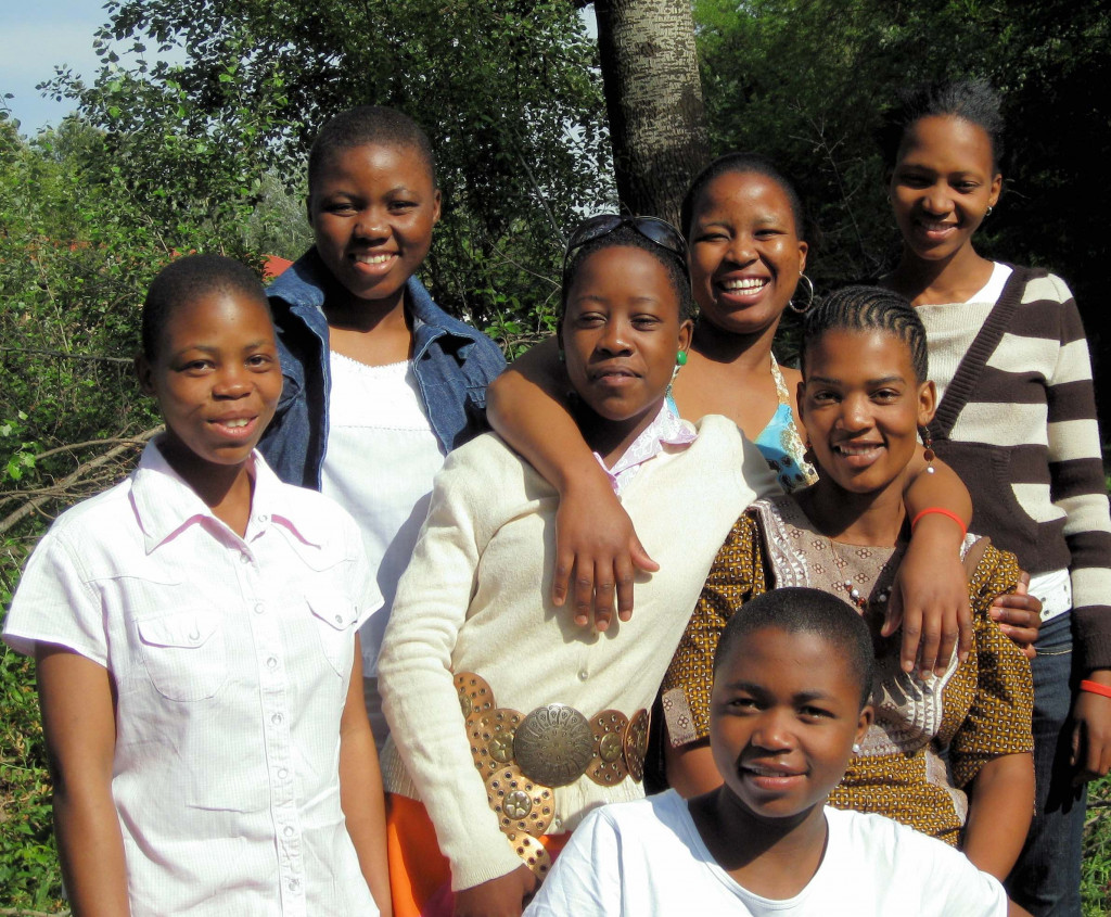 Young men and women in Lesotho wearing jeans and t-shirts