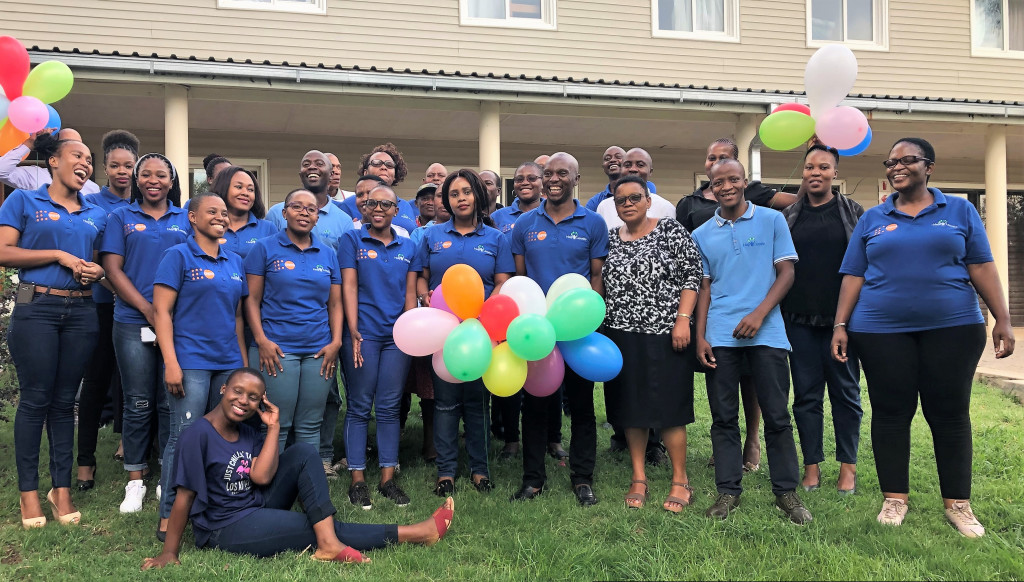 Staff gather to celebrate Help Lesotho's 15th anniversary.