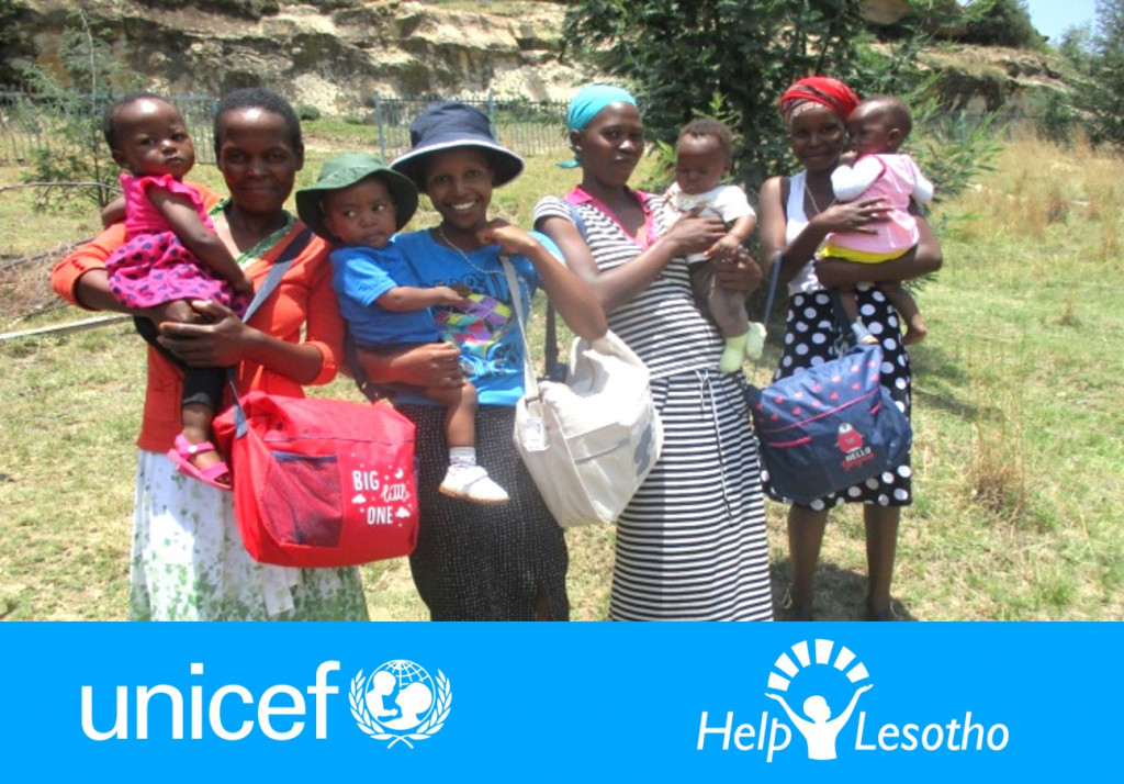 Young mothers holding infants in Lesotho